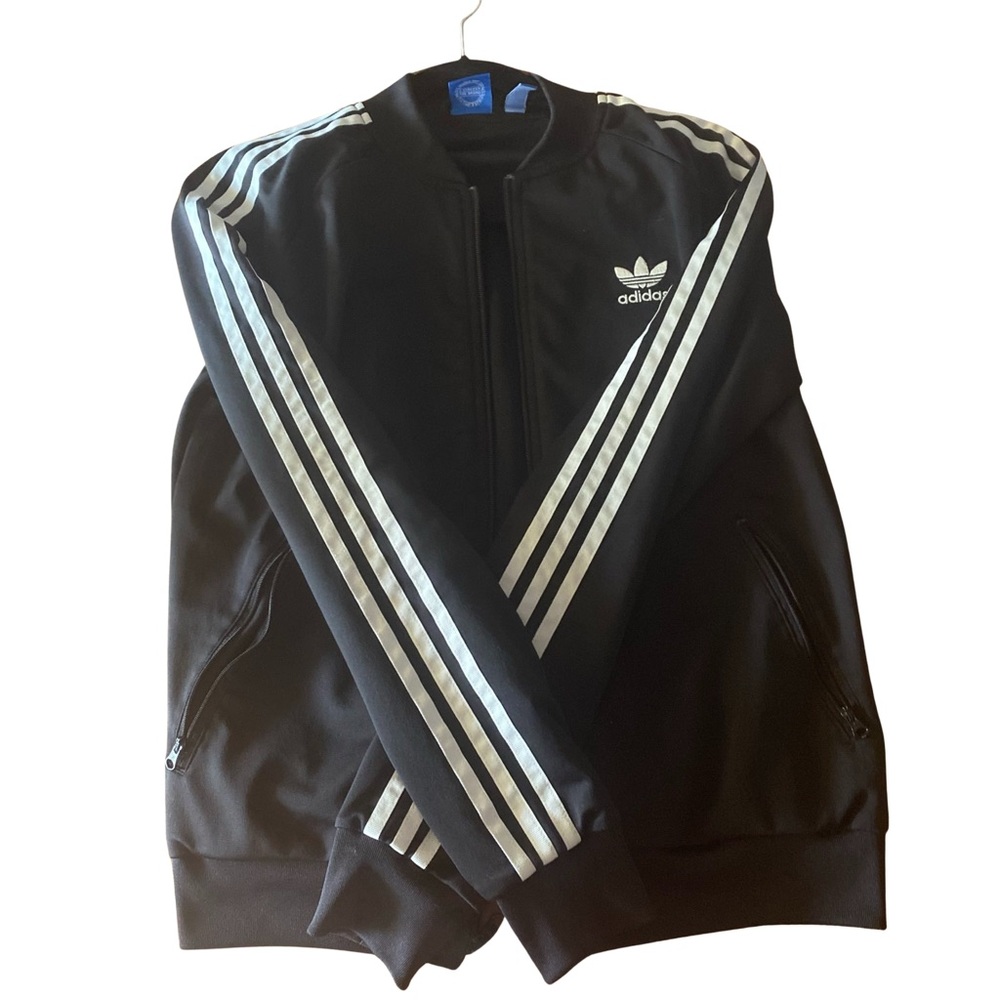Adidas Woman’s Jacket. Color: Black/White. Size: Medium.